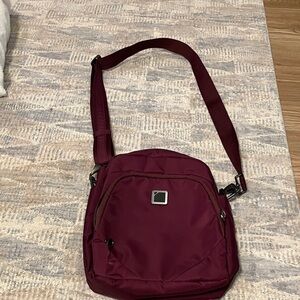Lewis and Clark anti theft Maroon Crossbody Bag